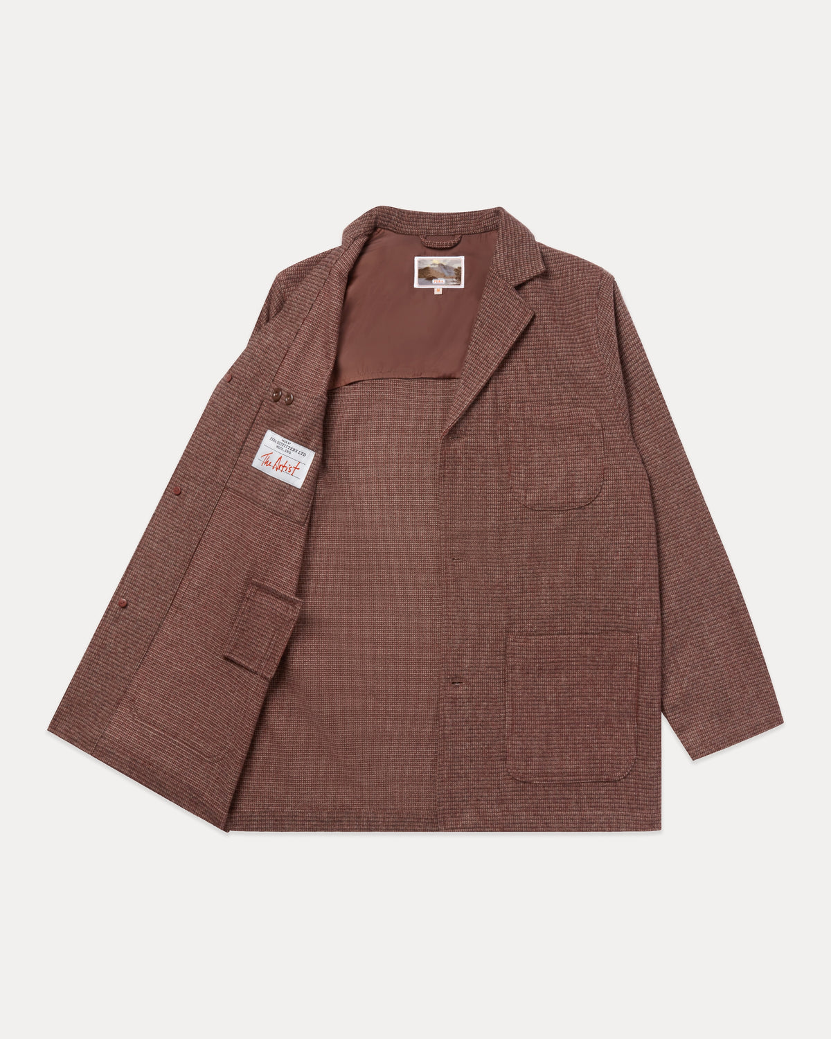 Fera Studio Jacket in Tweed laid open to show the brown lining and "The Artist" label